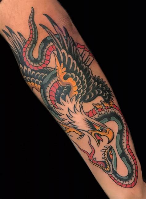 eagle with snake tattoo meaning|native american eagle tattoos.